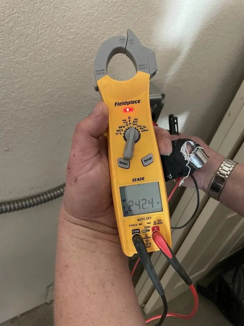 Voltage testing with clamp meter during Generator Installation in Goleta